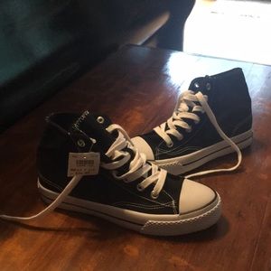 Women’s legacee black and white high top shoes